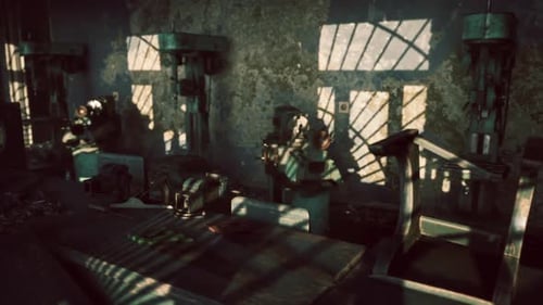Abandoned Workshop with Vintage Machinery Illuminated By Sunlight