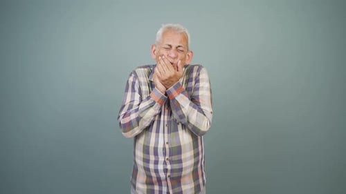 Man with toothache.