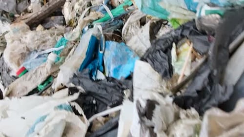 Indian Ocean Bali Garbage on the Ocean Empty Used Dirty Plastic Bottles Vertical Video