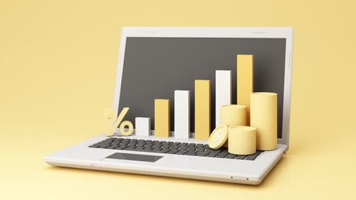 Laptop with Financial Growth Graph and Coins