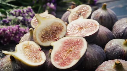 Whole Delicate Fresh Ripe Figs With Flowers and Water Drops Ficus Carica Side View Healthy Aesthetic