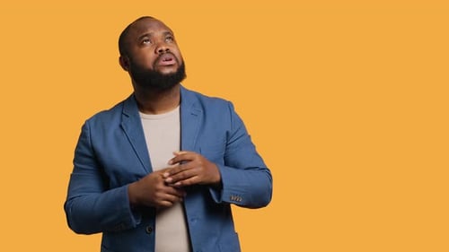 Happy Man Pleased with Himself Feeling Blessed Studio Background