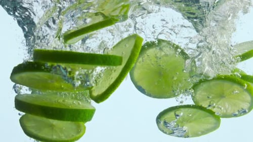 Lime Slices Plunge into Water