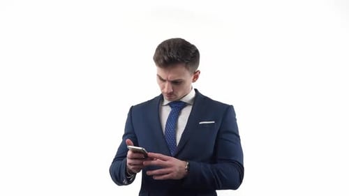 Man in Suit Celebrates Smartphone Success
