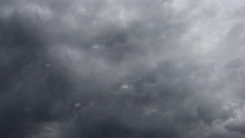 views of thick cumulonimbus clouds in the sky as well as thunderstorms.