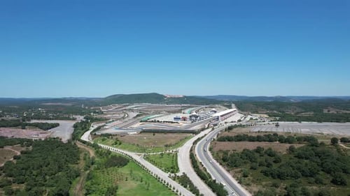 Aerial View of Racetrack Surrounded by Greenery
