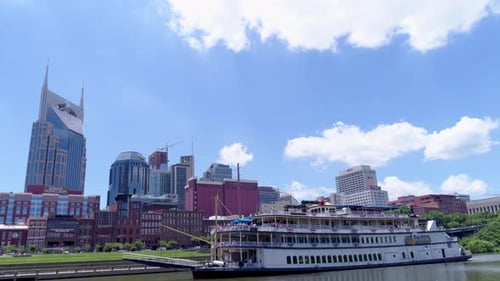 Nashville, TN / April 5, 2016: Ferry Heading Up Nashville River, Cityscape