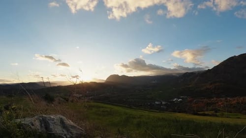 Clouds and Landscape Before Sunset Sky