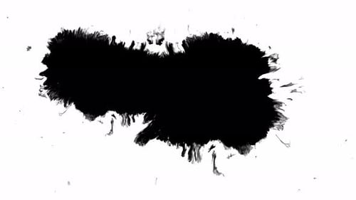 Black Ink Spreading on White Background