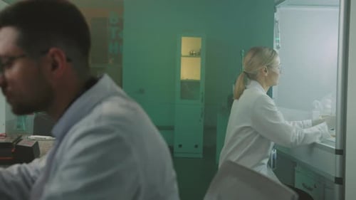 Scientists Conducting Research in Modern Laboratory Setting