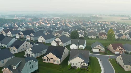Aerial of suburban America homes in residential community. American town, USA.