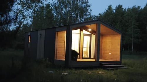 Modern Cabin in Rural Setting at Night