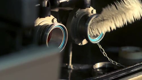 Worker Cleans The Drain Hole In The Tank With Cleaning Brush/Industrial Connectors On Milk Truck/...