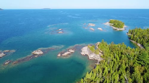 A large stone cape among the beautiful sea.