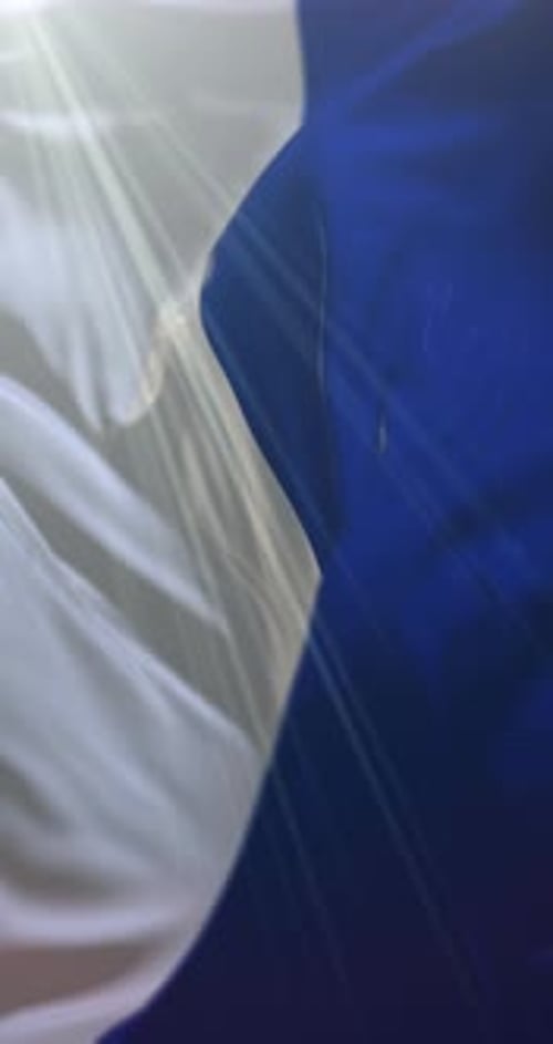 Flowing Silk Fabric Background Loop with Light Rays