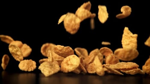 Cornflakes Fall on the Table Filmed on a Highspeed Camera at 1000 Fps