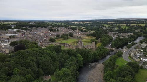 Barnard Castle market town in Teesdale, County Durham,UK Drone push in footage