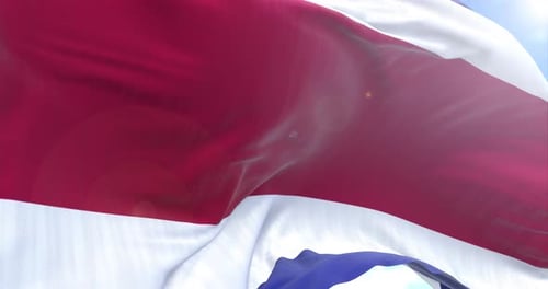 Realistic Waving Flag Animation with Blue Sky Background