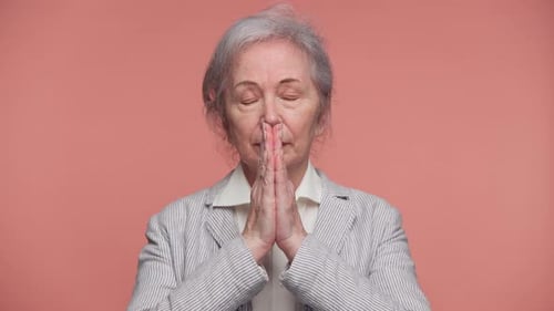 Senior Woman Posing in Front of Camera