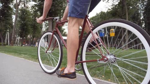 Unrecognizable Young Man Riding a Vintage Bicycle Sporty Guy Cycling at the Park Healthy Active