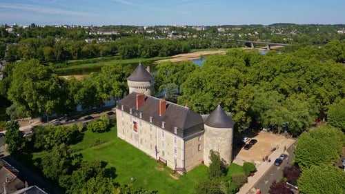 Chateau de Tours and Loire river in sunlight, aerial