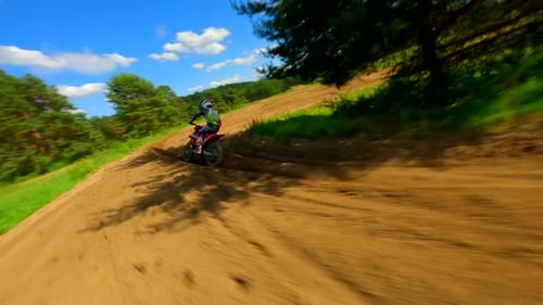 Motorcycle Rider Racing on Dirt Track Aerial Shot