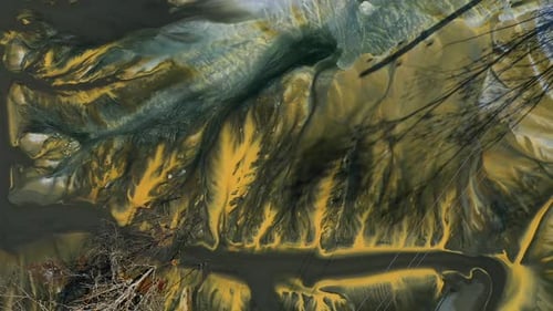 Aerial view of acid mine water drainage flow, toxic mine waters polluting nature