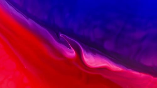 Swirling Red and Blue Ink Abstract Background