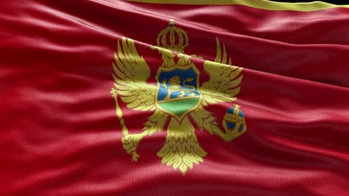 Rendu 4k Vidéo du drapeau du Monténégro ondulant dans le vent Drapeau du Monténégro ondulant en boucle