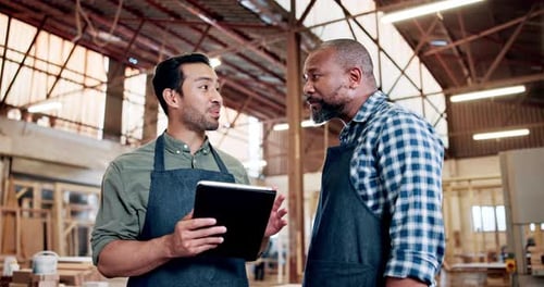 Woodwork, men and talking with tablet in workshop for order update, inventory and design review