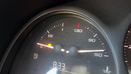 Running on Empty: The Low Gasoline Fuel Gauge Indicator
