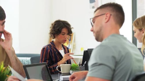 Business, People And Corporate Concept - Team Of Startuppers Or Ui Designers Working At Office