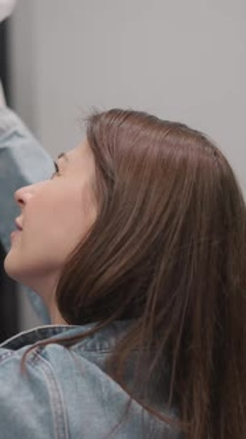 Woman Shopping for Clothes in Retail Store