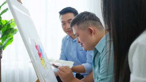 People Painting Together Indoors