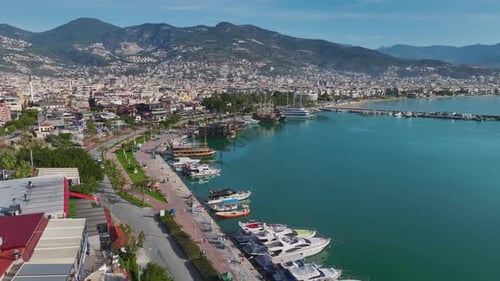 Aerial Video of a Beautiful Yacht Marina With Sparkling Blue Waters and a Clear Sky Captured From