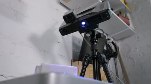 A Closeup 3d Scanner Scans a Plastic Part for Printing on a 3d Printer