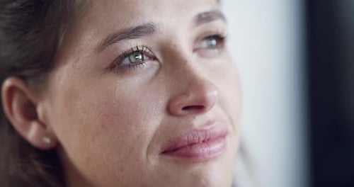 Crying Woman with Tears Streaming Down Face