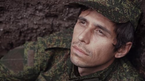 Close up of Soldier Resting in Trench