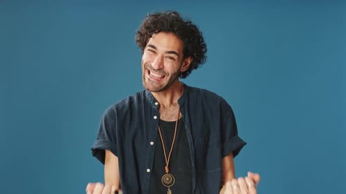 Excited Man Cheers and Celebrates Good News