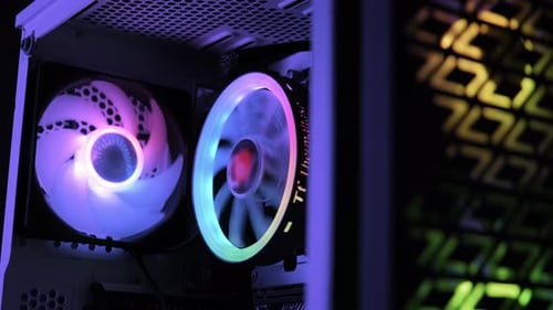 Personal Computer Cooling Unit with the Fan of the Stylish Lights Modern PC Close Up Shot