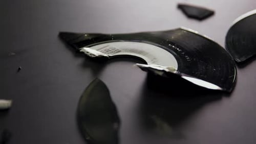 Close Up Camera Pan over broken records