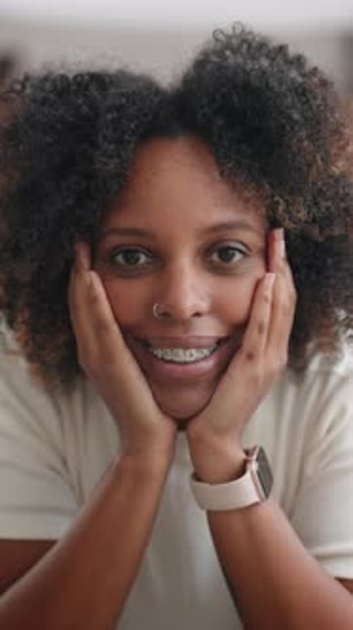 Smiling Woman with Braces Posing in Portrait
