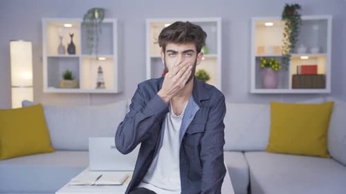 Man getting angry at camera.