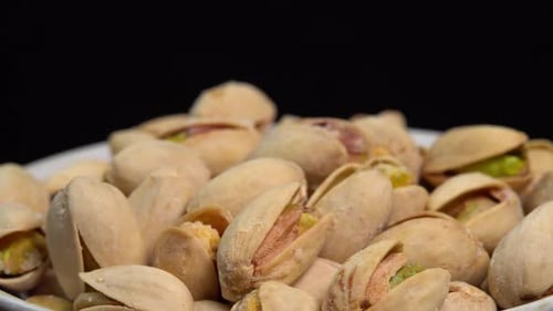 Heap of Tasty Pistachios Rotating