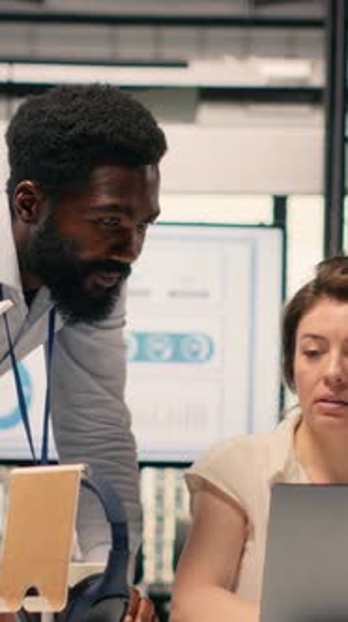 Vertical Video Professional Team Analyzing Income Data Taxes and Compliance Reports