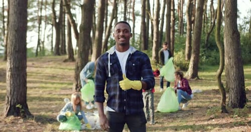 Volunteers Cleaning Trash in the Forest