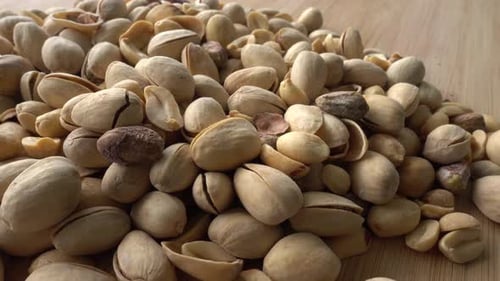 Food background. Roasted pistachio nuts seed with shell close up. Dieting concept