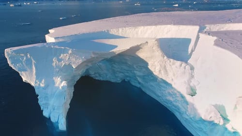 Massive Iceberg Drifts Sunset Polar Arctic Ocean
