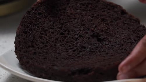 picking second layer of cake close up