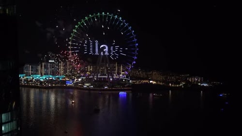 Video about a giant wheel with a fireworks show in the city of Dubai United Arab Emirates